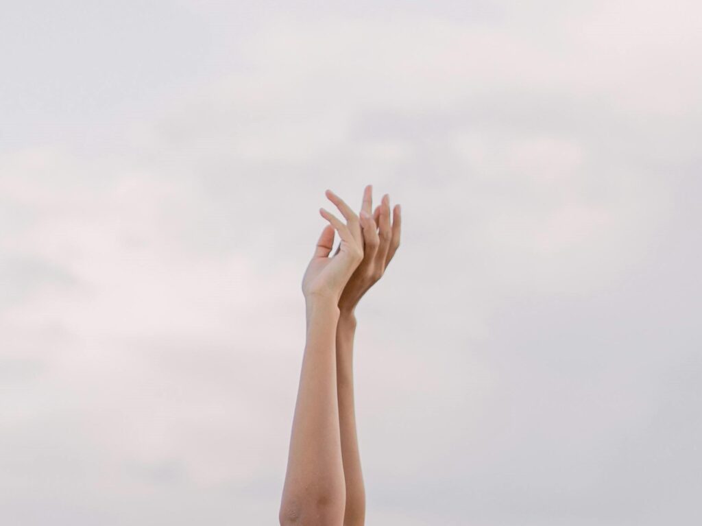 How to Keep the Sabbath Holy: 3 Powerful Ways to Live From Rest, Not For It 4 How to Keep the Sabbath Holy: Worship (image: hands raised against the sky)