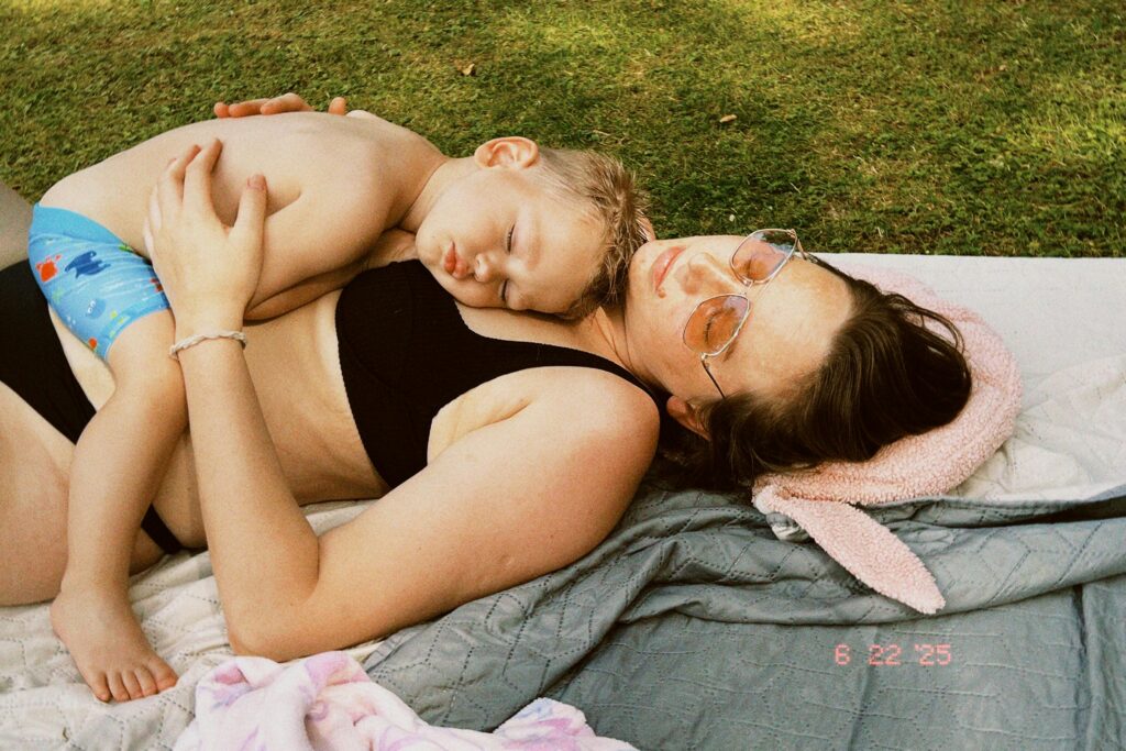 How to Keep the Sabbath Holy: 3 Powerful Ways to Live From Rest, Not For It 5 How to Keep the Sabbath Holy: stop working (image: mother and child asleep together on the grass)