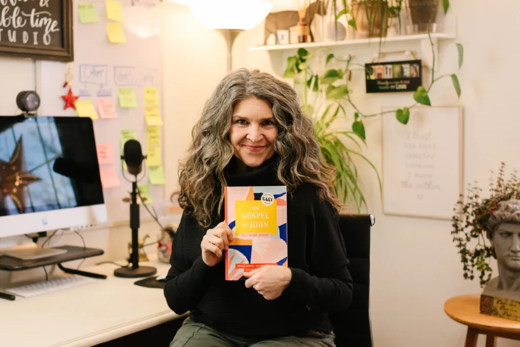 Ellen (Mentor Mama) of Coffee and Bible Time holding The Gospel of John Book