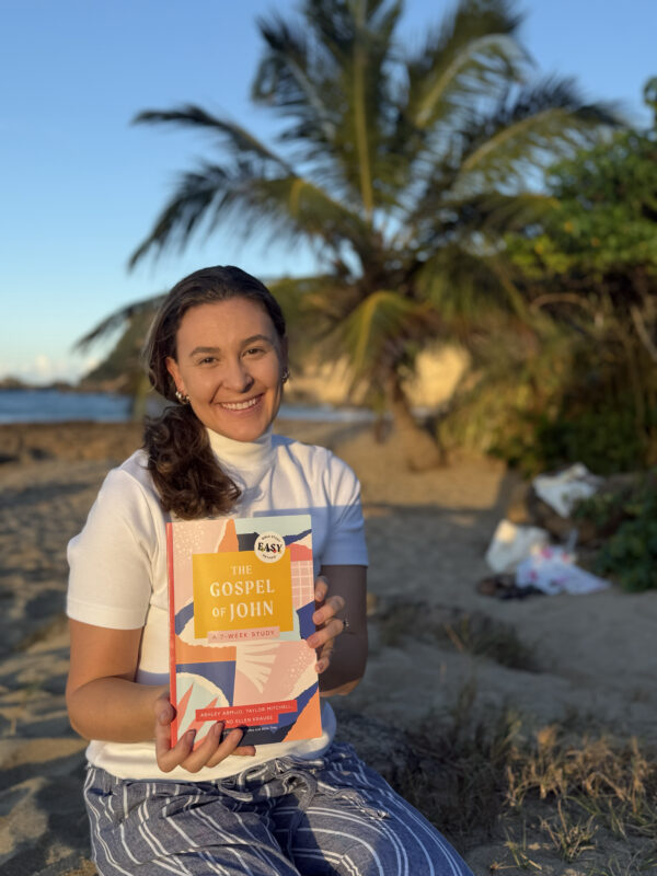 Ashley Holding the Gospel of John Bible Study Book