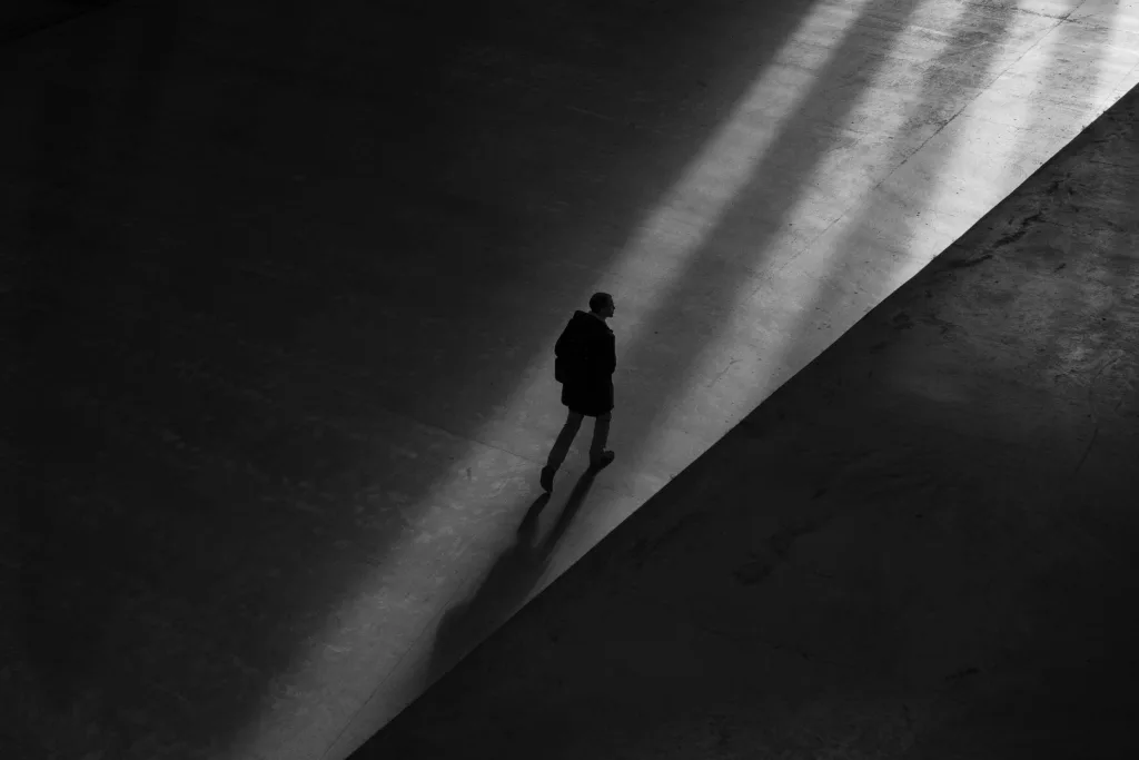 The Loneliness of a New Life—and the Fight to Keep Walking- a man walking alone