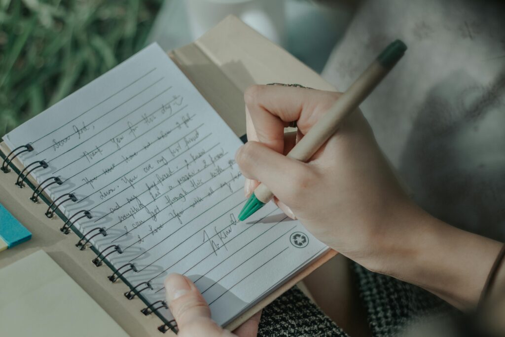 Woman journaling about how to get out of the rut