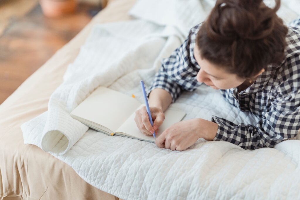 Woman journaling about trusting in God's timing