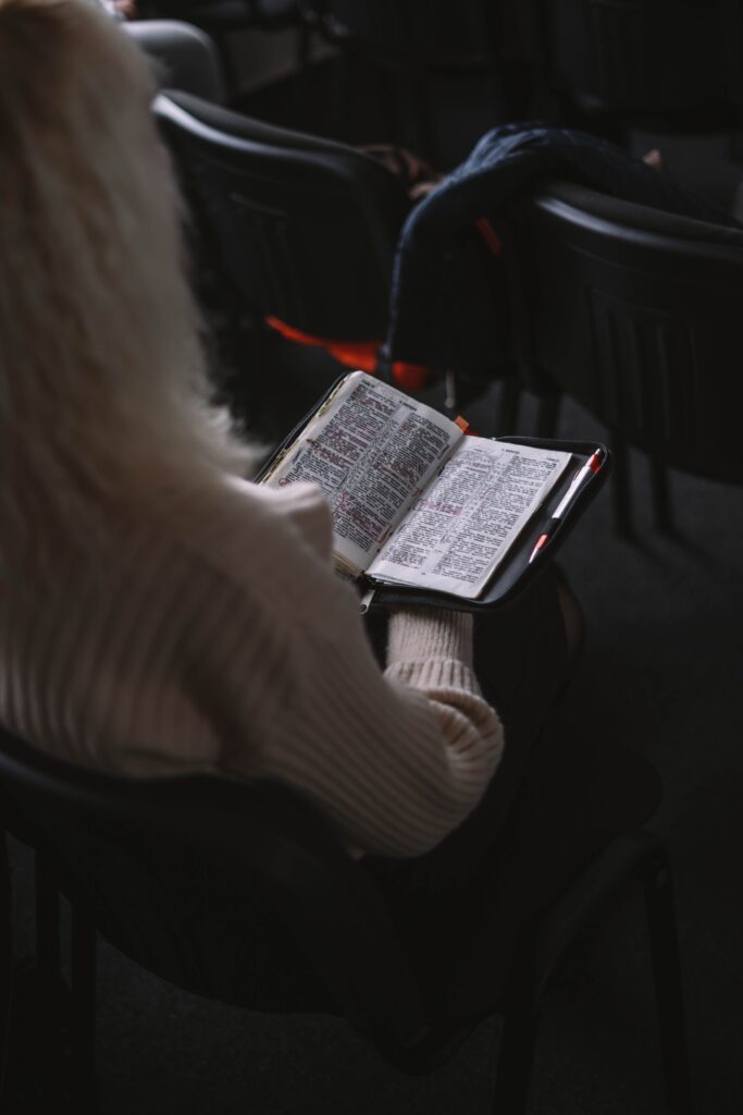 Woman reading Romans 12:1-2